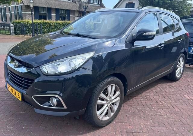 Zwart Gebruikt 2010 Hyundai ix35 SUV | € 7.999 (Eerlijke prijs) - Afbeelding 1/4