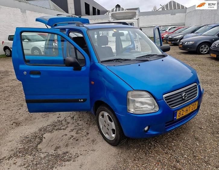 Blauw (metallic) Gebruikt 2001 Suzuki Wagon R+ Stationwagen | € 1.399 (Goede deal) - Afbeelding 1/4