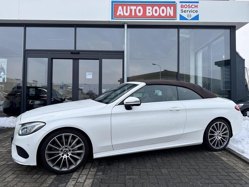 Wit Gebruikt 2018 Mercedes C180 AMG Line Premium Plus Cabriolet | € 27.950 (Eerlijke prijs) - Afbeelding 1/4