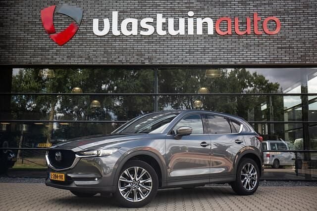 Grijs Gebruikt 2021 Mazda CX-5 Signature SUV | € 32.900 (Eerlijke prijs) - Afbeelding 1/4