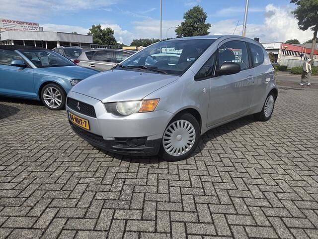 Grijs Gebruikt 2010 Mitsubishi Colt Hatchback | € 1.750 (Duur) - Afbeelding 1/4