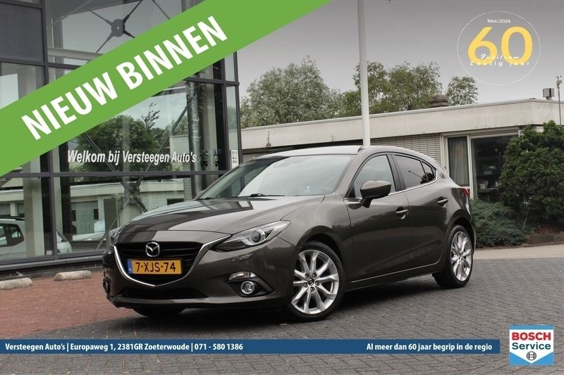 Bruin, metallic lak Gebruikt 2014 Mazda 3 Hatchback | € 9.950 (Duur) - Afbeelding 1/4
