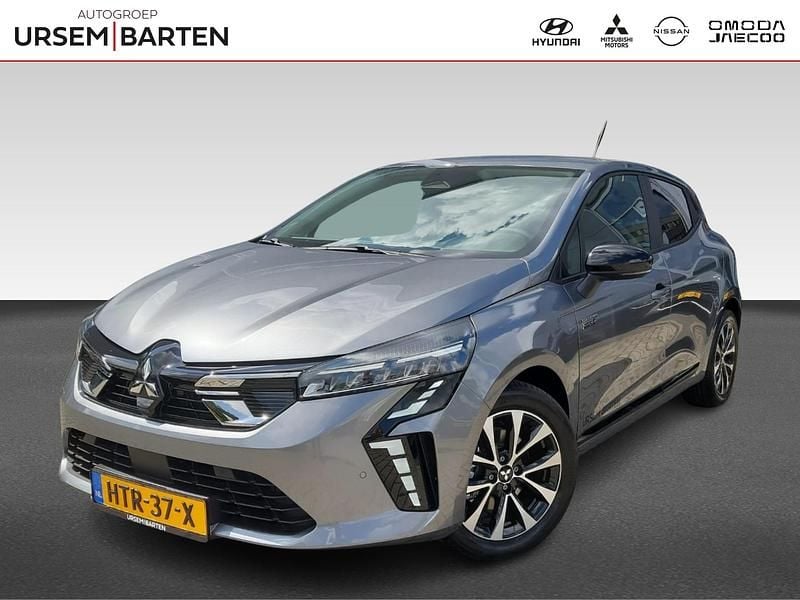 Grijs metallic Gebruikt 2025 Mitsubishi Colt Intense Hatchback | € 22.930 (Goede deal) - Afbeelding 1/4