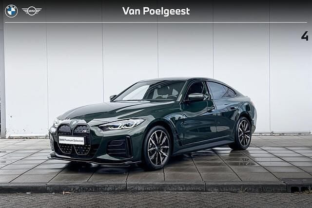 Sanremo grun metallic (groen metallic) Gebruikt 2022 BMW i4 Executive Sedan | € 44.900 (Eerlijke prijs) - Afbeelding 1/4