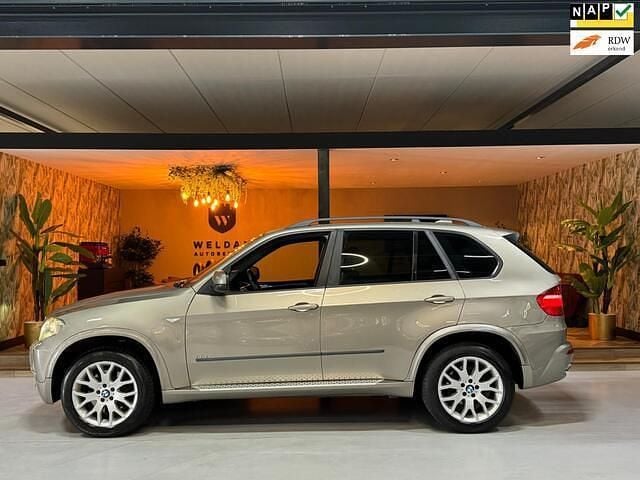 Bruin Gebruikt 2009 BMW X5 Comfort Edition SUV | € 21.990 (Eerlijke prijs) - Afbeelding 1/4