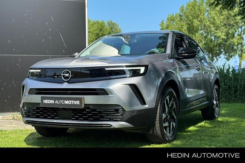 Grijs Gebruikt 2024 Opel Mokka SUV | € 22.945 (Eerlijke prijs) - Afbeelding 1/4