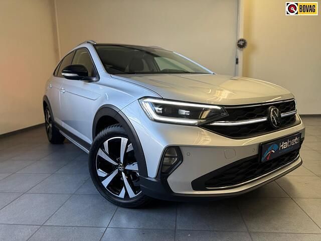 Grijs Gebruikt 2022 VW Taigo SUV | € 23.450 (Goede deal) - Afbeelding 1/4