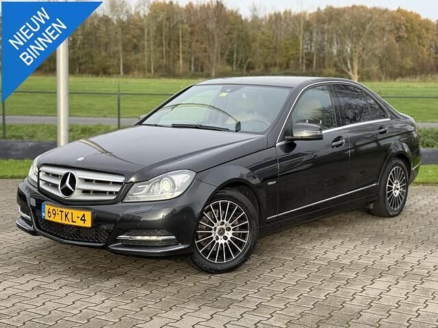 Zwart Gebruikt 2012 Mercedes C200 Premium Sedan | € 11.250 (Eerlijke prijs) - Afbeelding 1/4
