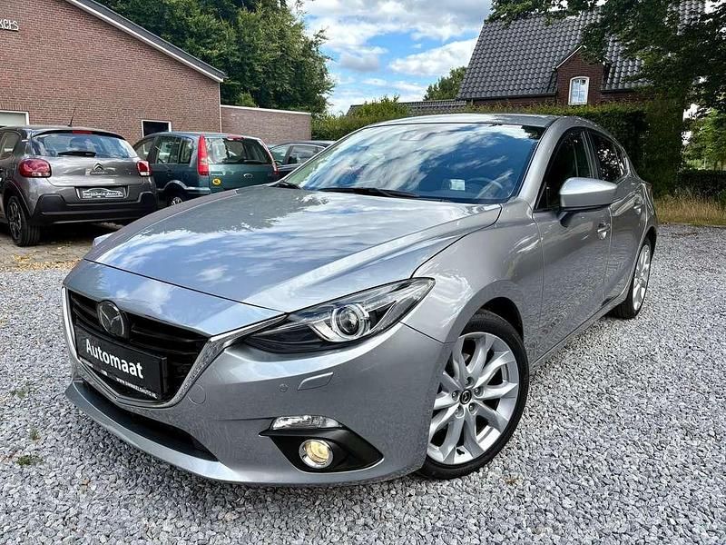 Grijs Gebruikt 2016 Mazda 3 Hatchback | € 16.950 (Eerlijke prijs) - Afbeelding 1/4