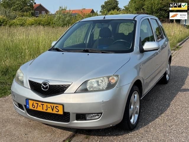 Grijs Gebruikt 2006 Mazda 2 Touring MPV | € 1.249 (Goede deal) - Afbeelding 1/4