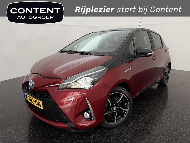 Rood Occasion 2017 Toyota Yaris Hybrid Hatchback | € 13.240 (Goede deal) - Afbeelding 1/4