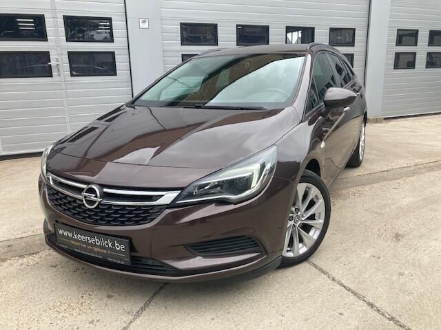 Bruin Gebruikt 2016 Opel Astra Edition Stationwagen | € 10.900 (Iets duurder) - Afbeelding 1/4