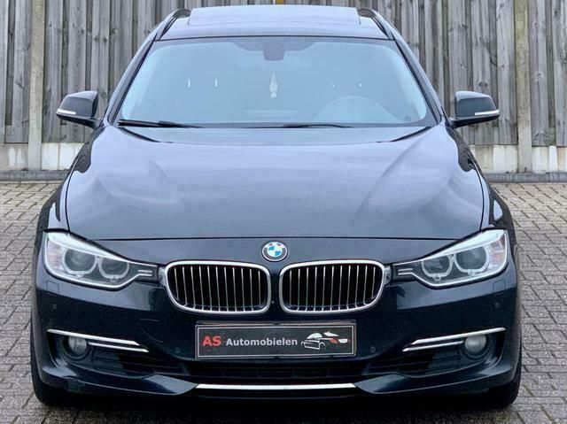 Zwart Gebruikt 2013 BMW 330 Luxury Line Stationwagen | € 14.950 - Afbeelding 1/4