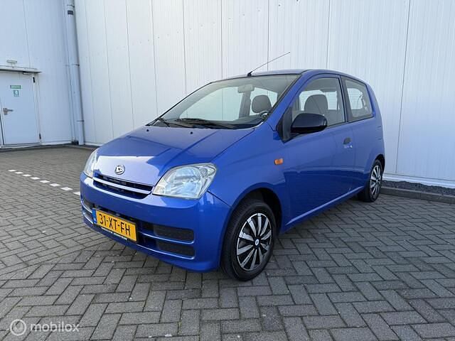 Occasion Daihatsu Cuore 58 PK (42 kW) 2007 Blauw Hatchback