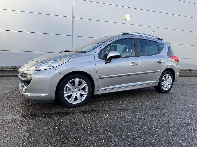 Grijs Gebruikt 2009 Peugeot 207 Stationwagen | € 3.190 (Eerlijke prijs) - Afbeelding 1/4