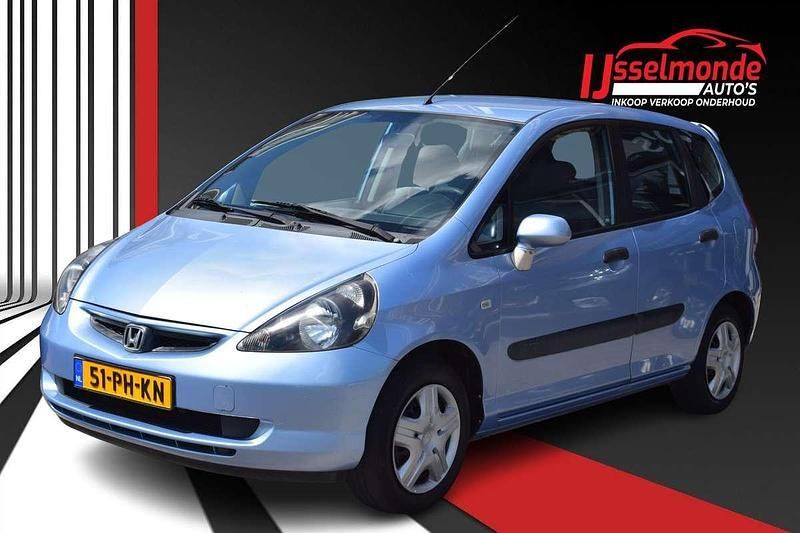 Blauw, metallic lak Gebruikt 2004 Honda Jazz ES Hatchback | € 1.000 (Goede deal) - Afbeelding 1/4