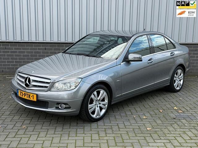 Grijs Gebruikt 2011 Mercedes C180 Business Sedan | € 9.649 (Eerlijke prijs) - Afbeelding 1/4