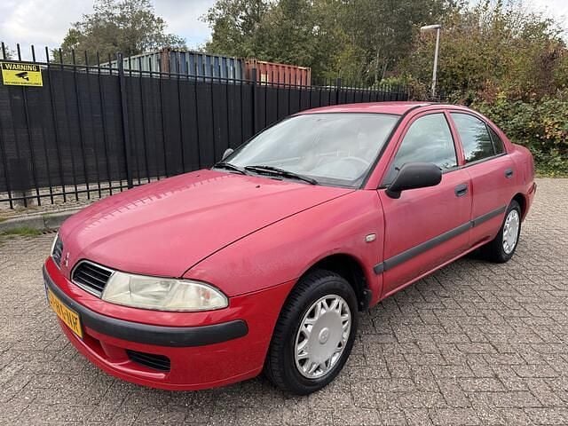 Rood Gebruikt 2001 Mitsubishi Carisma Hatchback | € 650 - Afbeelding 1/4