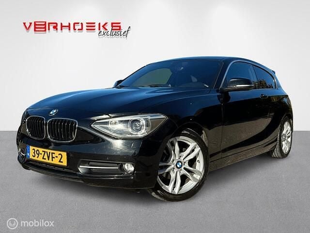 Zwart Gebruikt 2013 BMW 116 Sport Line Hatchback | € 7.450 (Goede deal) - Afbeelding 1/4