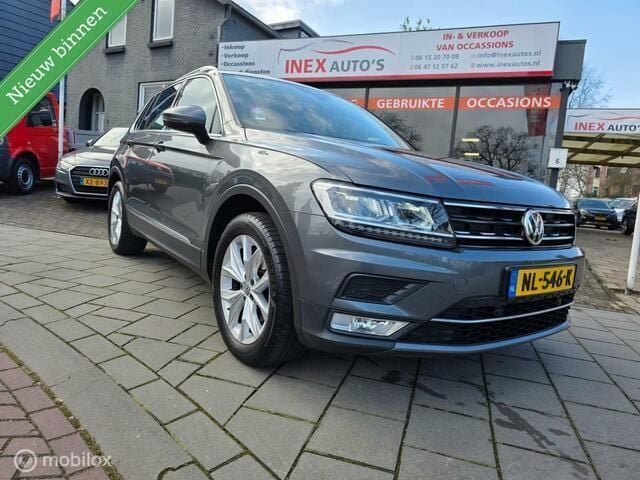 Grijs Gebruikt 2017 VW Tiguan Highline SUV | € 17.945 (Goede deal) - Afbeelding 1/4