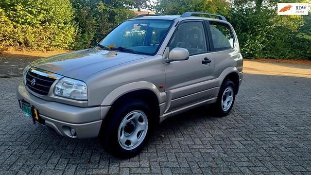 Beige Gebruikt 2001 Suzuki Grand Vitara SUV | € 4.775 - Afbeelding 1/4