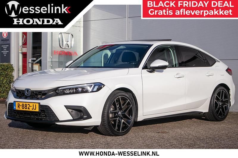 Wit Gebruikt 2022 Honda Civic Advance Hatchback | € 29.950 - Afbeelding 1/4