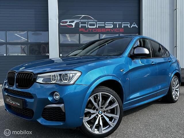 Blauw Gebruikt 2017 BMW X4 Executive SUV | € 34.945 (Eerlijke prijs) - Afbeelding 1/4