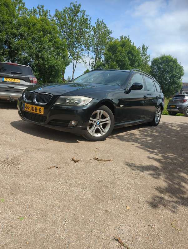 Zwart Gebruikt 2009 BMW 316 Stationwagen | € 2.999 - Afbeelding 1/4