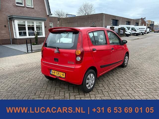 Occasion Daihatsu Cuore 69 PK (50 kW) 2008 Rood Hatchback