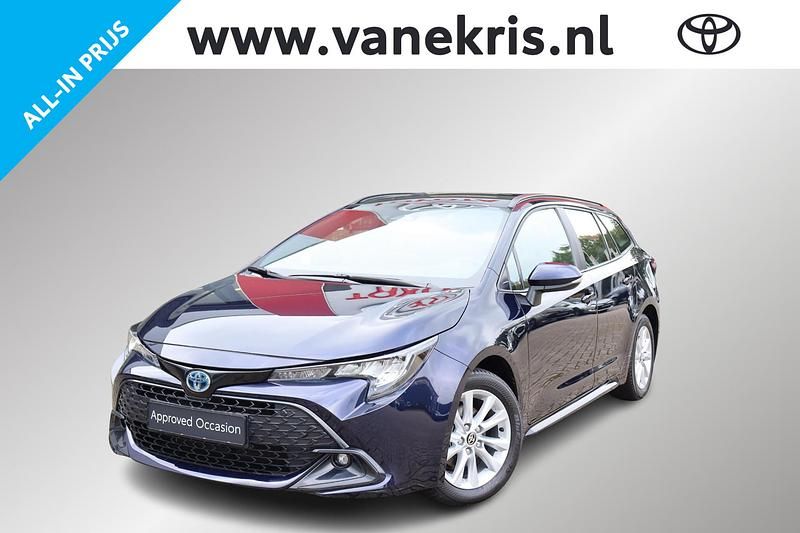Blauw Gebruikt 2024 Toyota Corolla Hybrid Active Stationwagen | € 28.399 - Afbeelding 1/4