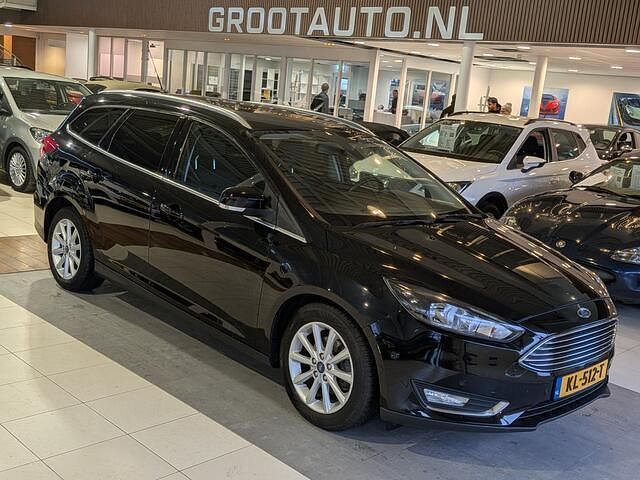 Zwart Gebruikt 2016 Ford Focus Titanium Stationwagen | € 6.444 (Goede deal) - Afbeelding 1/4
