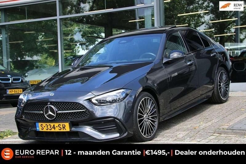 Grijs Gebruikt 2022 Mercedes C300e AMG line Sedan | € 43.995 (Goede deal) - Afbeelding 1/4