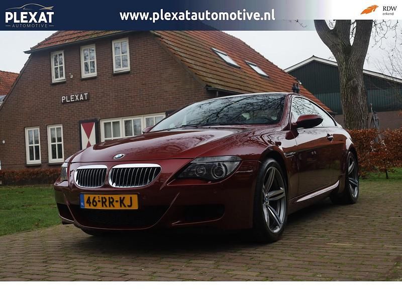 Rood (metallic) Gebruikt 2005 BMW M6 Coupé | € 24.845 - Afbeelding 1/4