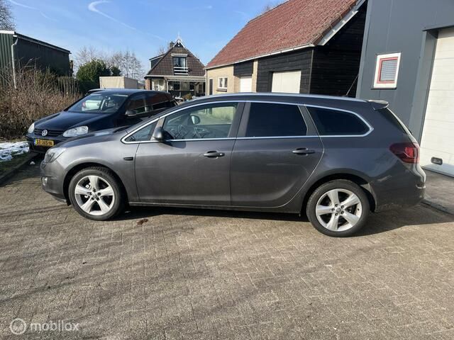 Grijs Gebruikt 2011 Opel Astra Cosmo Stationwagen | € 3.950 (Super prijs) - Afbeelding 1/4