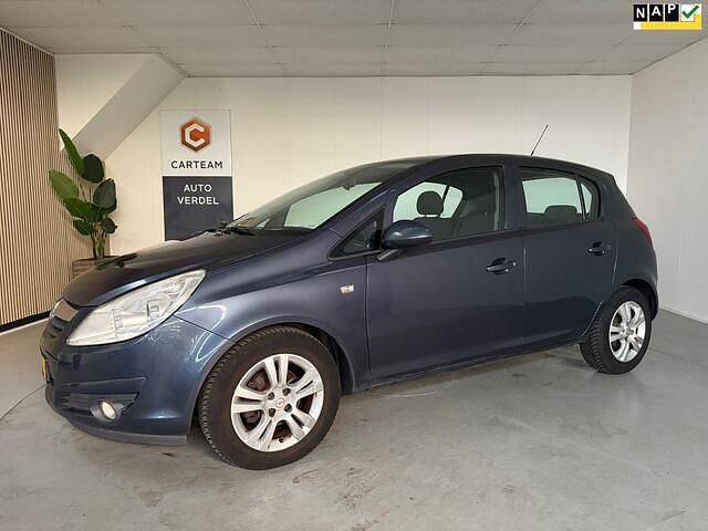 Grijs Gebruikt 2009 Opel Corsa Enjoy Hatchback | € 1.450 (Goede deal) - Afbeelding 1/4