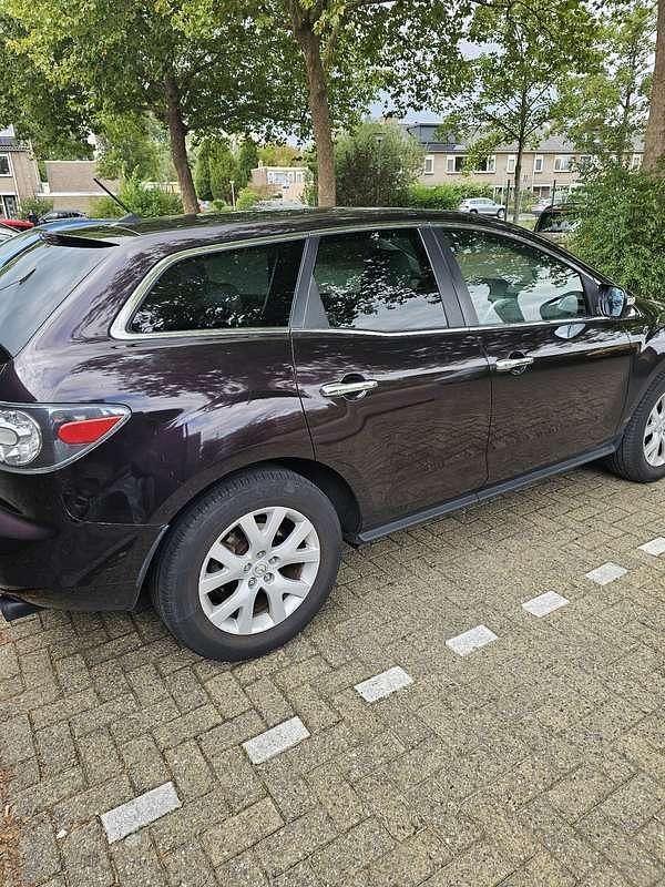 Paars Gebruikt 2007 Mazda CX-7 SUV | € 2.350 - Afbeelding 1/4