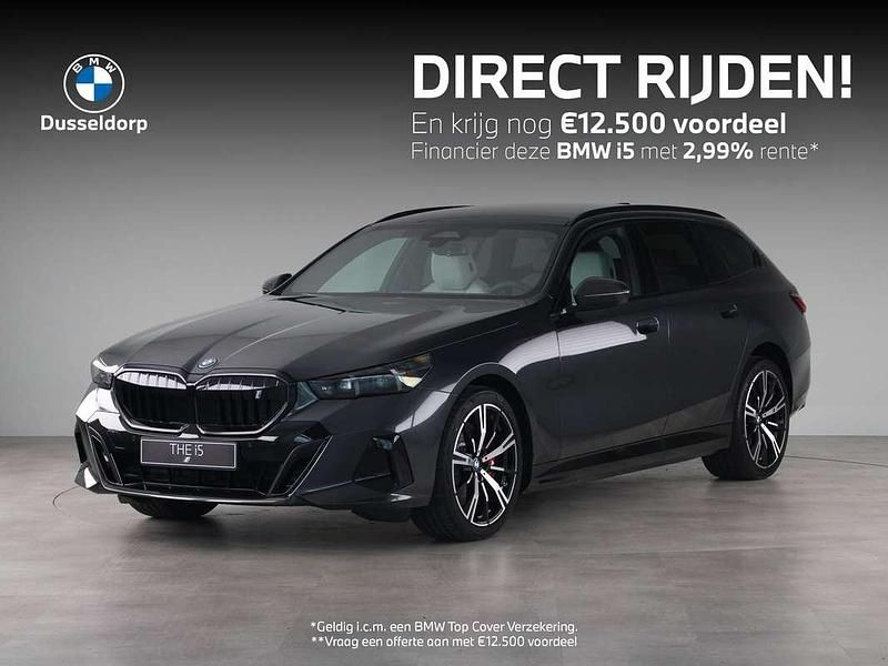 Grijs Nieuw 2025 BMW i5 M Sport Stationwagen | € 84.228 (Goede deal) - Afbeelding 1/4