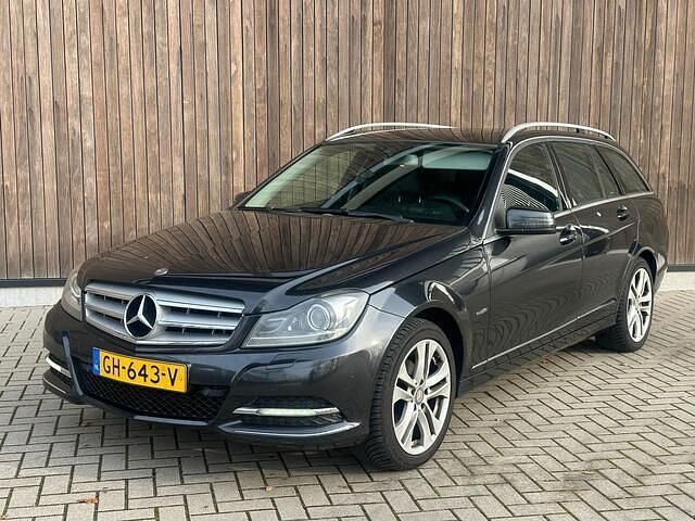 Zwart (metallic) Occasion 2011 Mercedes C200 Business Stationwagen | € 3.999 (Eerlijke prijs) - Afbeelding 1/4