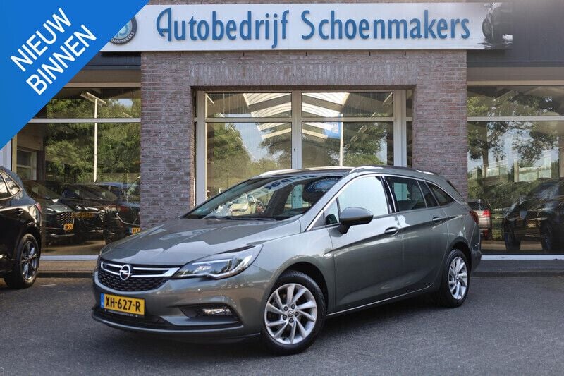 Grijs Gebruikt 2018 Opel Astra Stationwagen | € 12.990 (Eerlijke prijs) - Afbeelding 1/4