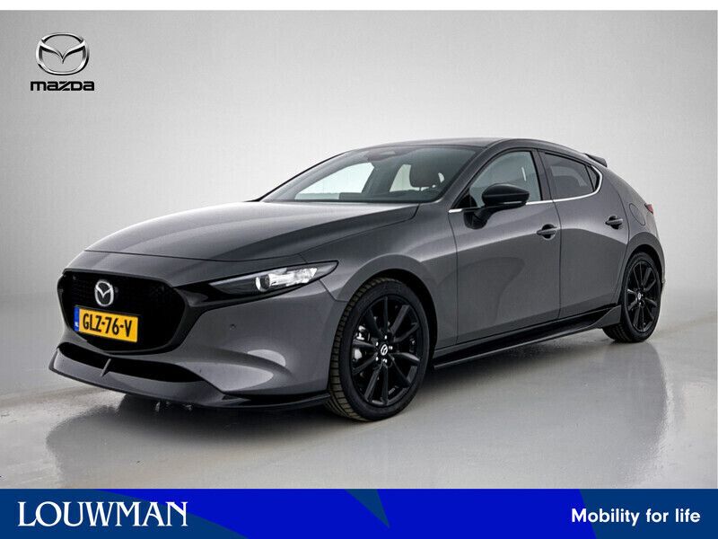 Grijs metallic Gebruikt 2024 Mazda 3 Nagisa Hatchback | € 36.885 (Duur) - Afbeelding 1/4