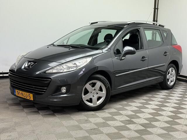 Grijs Gebruikt 2010 Peugeot 207 Style Stationwagen | € 3.975 (Iets duurder) - Afbeelding 1/4