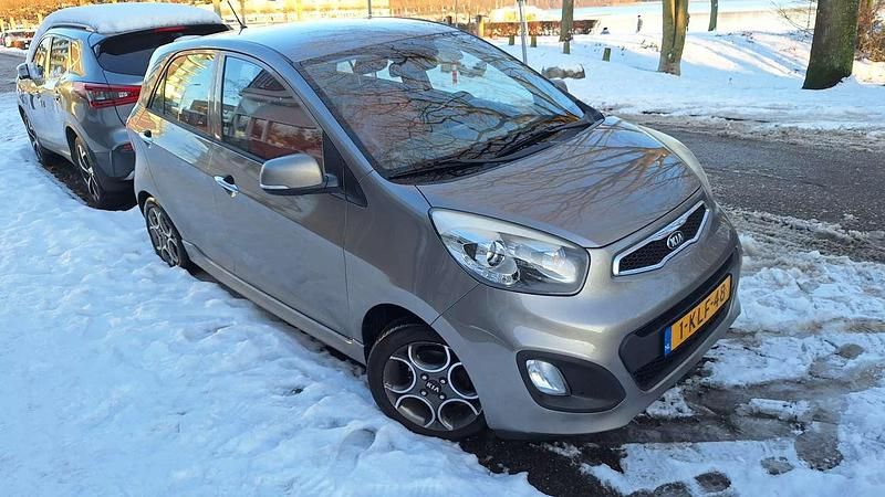 Brons Occasion 2013 Kia Picanto Hatchback | € 6.500 (Eerlijke prijs) - Afbeelding 1/4