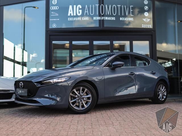 Grijs Gebruikt 2019 Mazda 3 Comfort Hatchback | € 18.950 (Eerlijke prijs) - Afbeelding 1/4