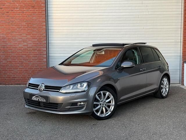 Grijs Gebruikt 2013 VW Golf VII Highline Hatchback | € 9.399 (Eerlijke prijs) - Afbeelding 1/4