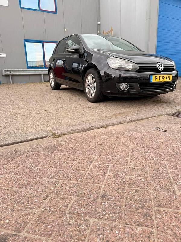 Zwart Gebruikt 2012 VW Golf VII Highline Stationwagen | € 8.850 (Iets duurder) - Afbeelding 1/4