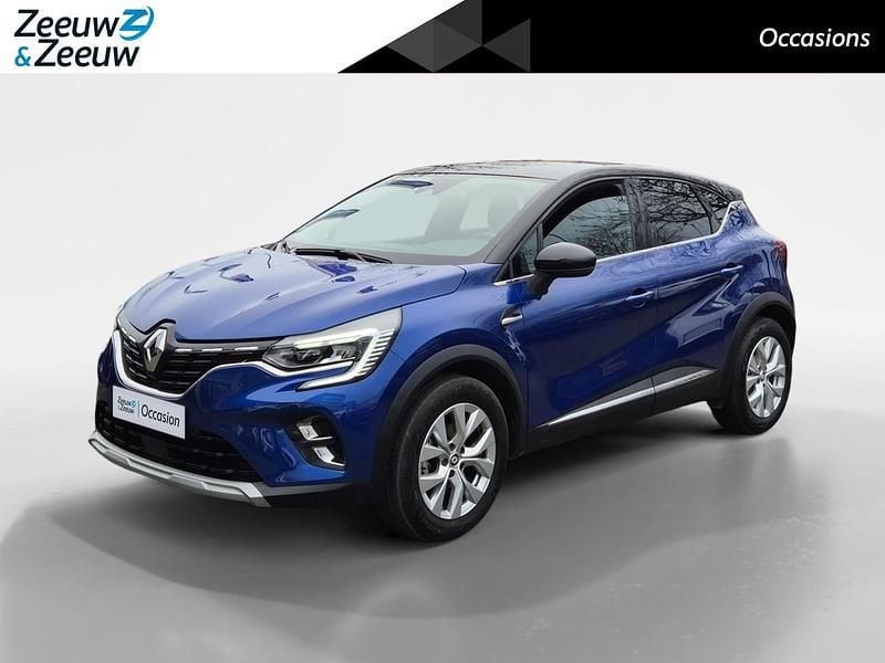 Twotone bleu iron / noir etoi Occasion 2021 Renault Captur Intens SUV | € 18.445 (Super prijs) - Afbeelding 1/4