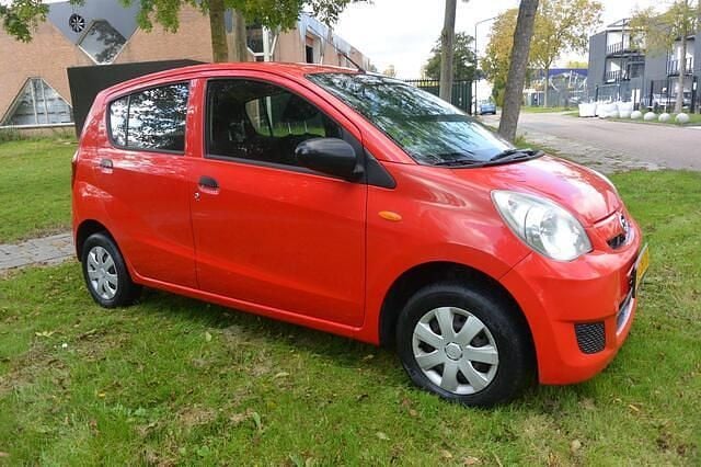 Occasion Daihatsu Cuore 69 PK (50 kW) 2008 Rood Hatchback