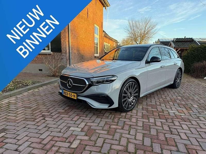 Grijs Occasion 2024 Mercedes E450 AMG line Stationwagen | € 99.950 (Eerlijke prijs) - Afbeelding 1/4