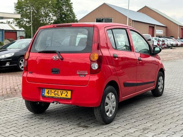 Occasion Daihatsu Cuore 69 PK (50 kW) 2008 Rood Hatchback