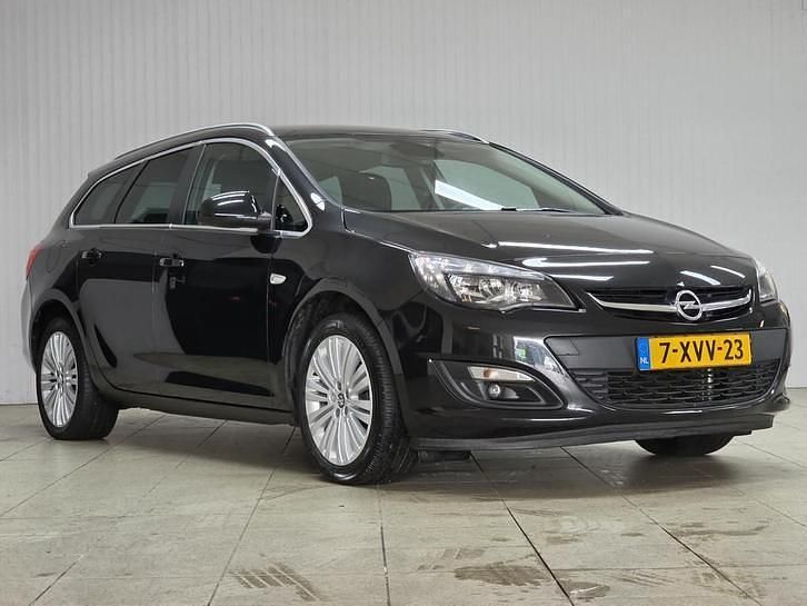Occasion Opel Astra Design Edition 120 PK (88 kW) 2014 Zwart (metallic) Stationwagen